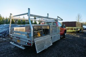 Construction truck with ProTech truck rack and storage boxes