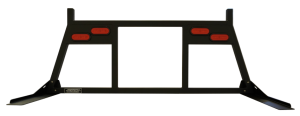 Steel cab rack with vertical uprights, integrated lights, and lumber stops